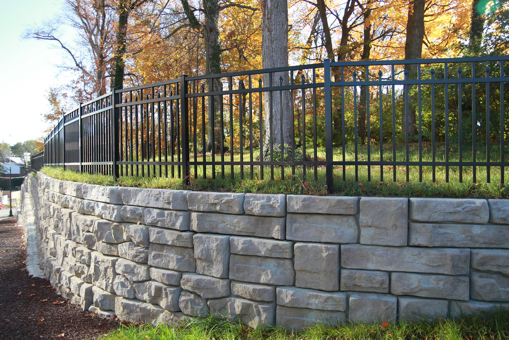 Retaining wall and fence