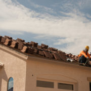 Worker working on roof